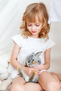 Child girl rabbit photo
