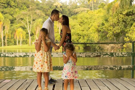 Family kiss photo