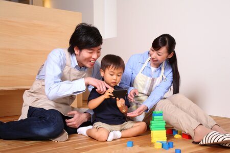 Father mother son smartphone