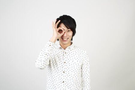 Man portrait finger glasses