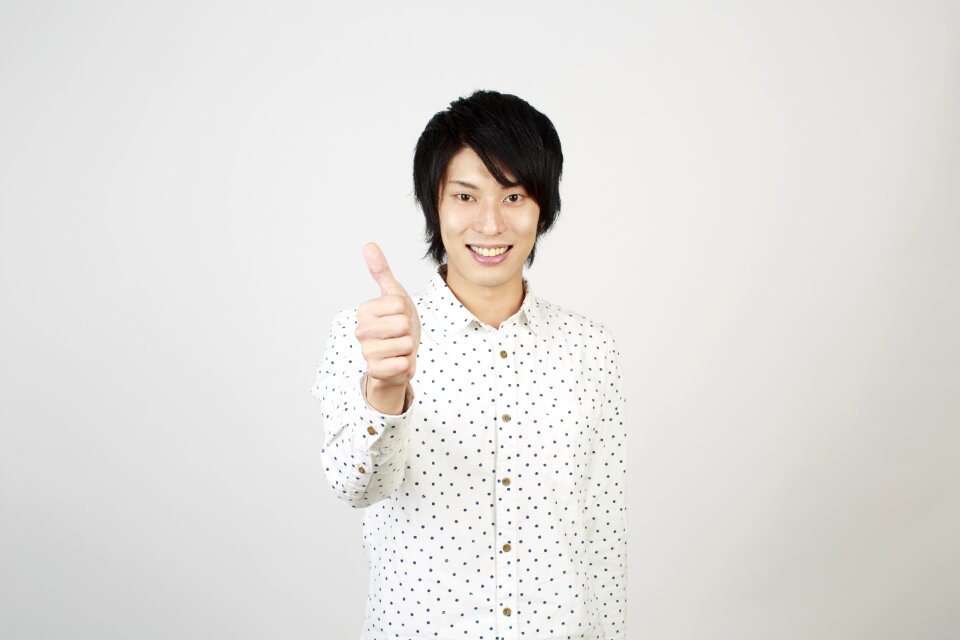 Man portrait thumbs up