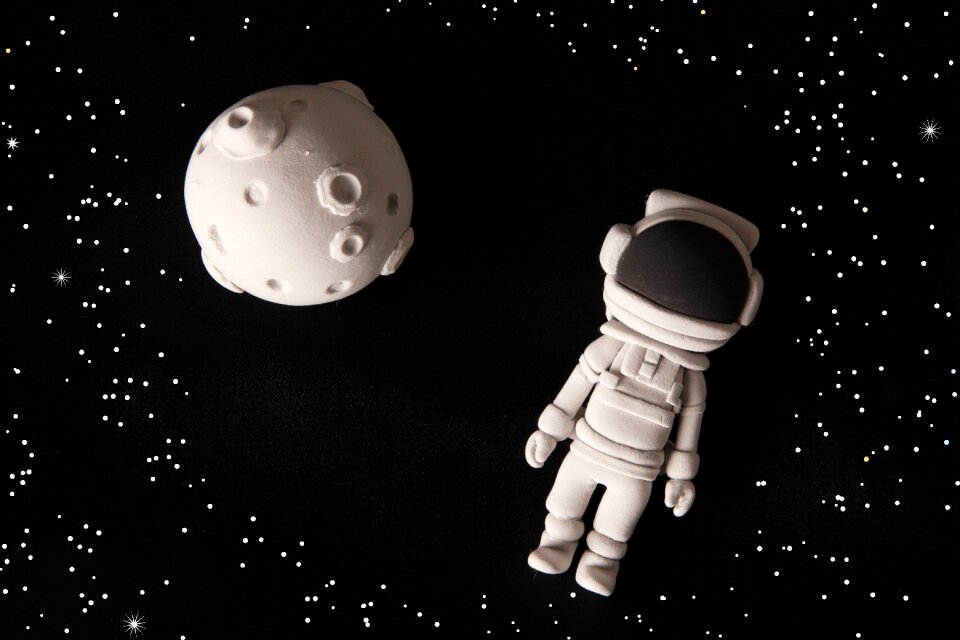 Moon astronaut doll