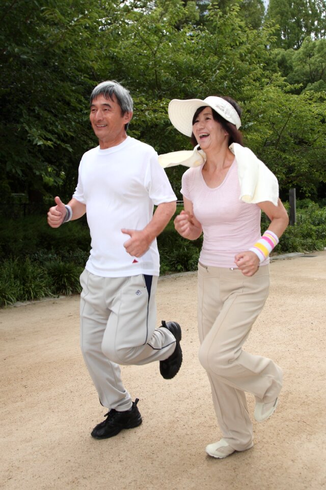 Old couple jogging running
