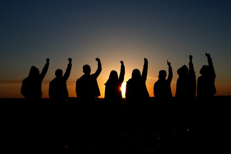 Sunset group silhouette photo