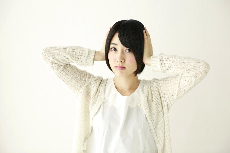 Woman girl cover ears