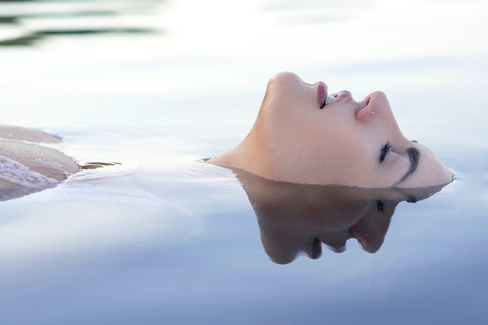 Woman girl water face