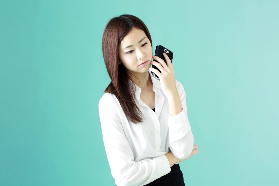 Business woman smart phone photo