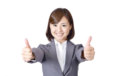 Business woman thumbs up photo