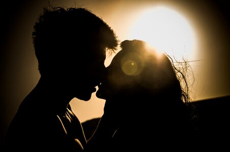 Couple kiss silhouette photo