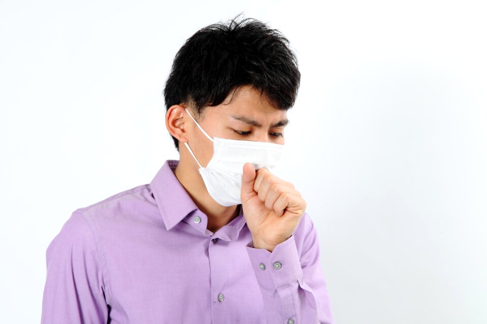 Man portrait cold cough