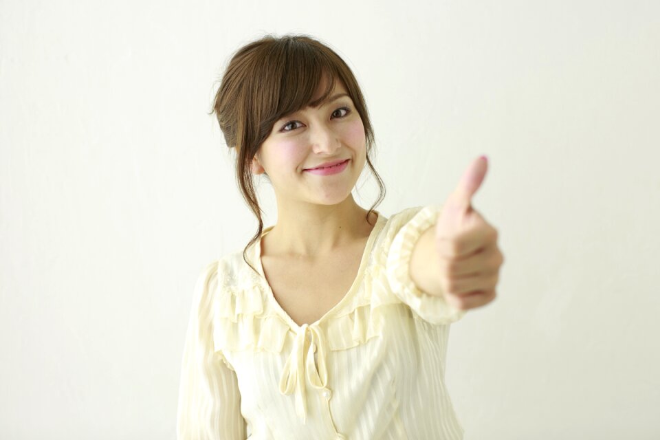 Woman girl portrait thumbs up