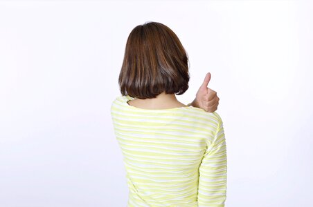 Woman girl thumbs up
