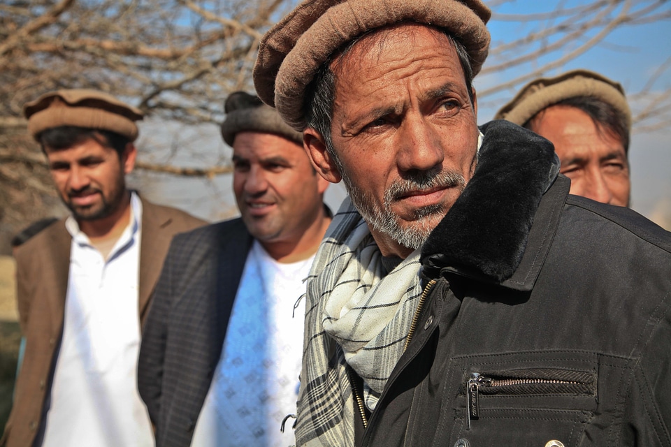 Village elders men cautious