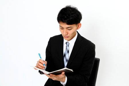 Business man notebook photo