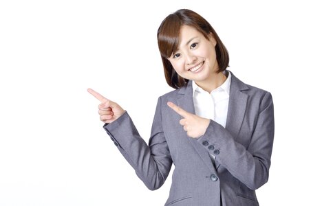 Business woman pointing finger photo