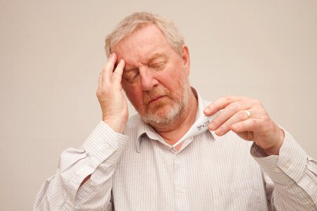 Senior man fever cold