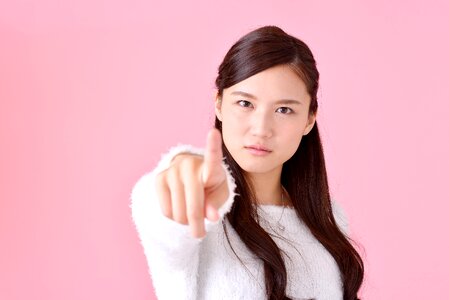 Woman girl pointing finger photo