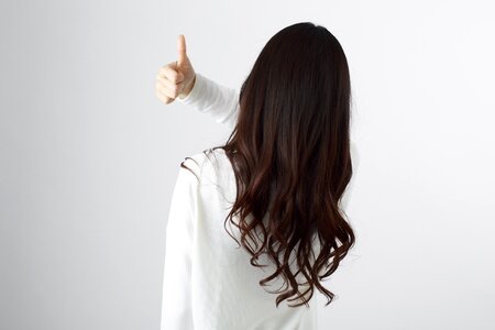 Woman girl thumbs up