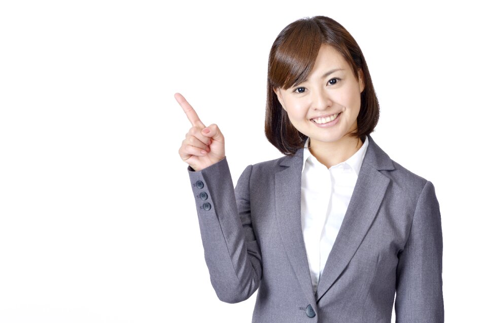 Business woman pointing finger