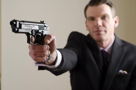 Man portrait gun