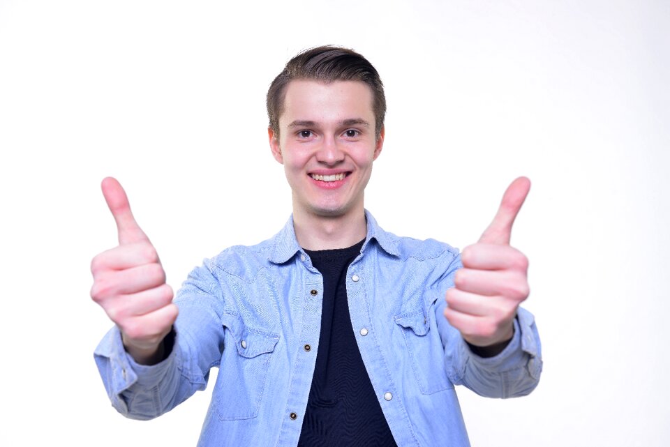 Man portrait thumbs up