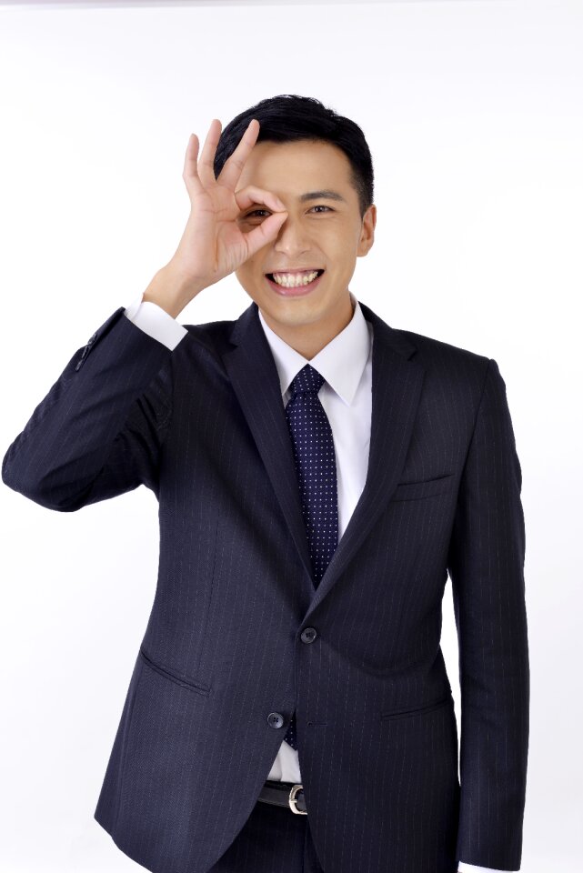 Businee man finger glasses