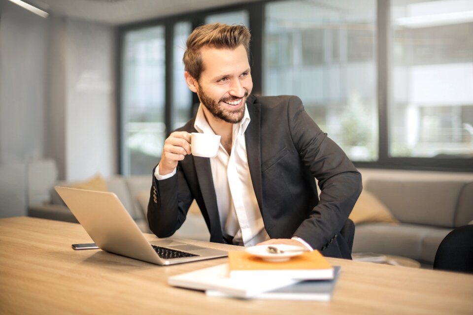 Business man coffee laptop computer