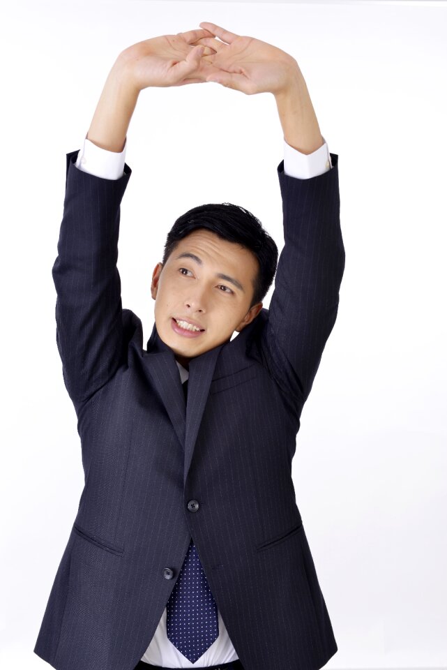 Businee man stretching photo