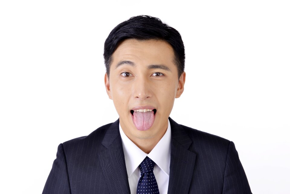 Business man tongue