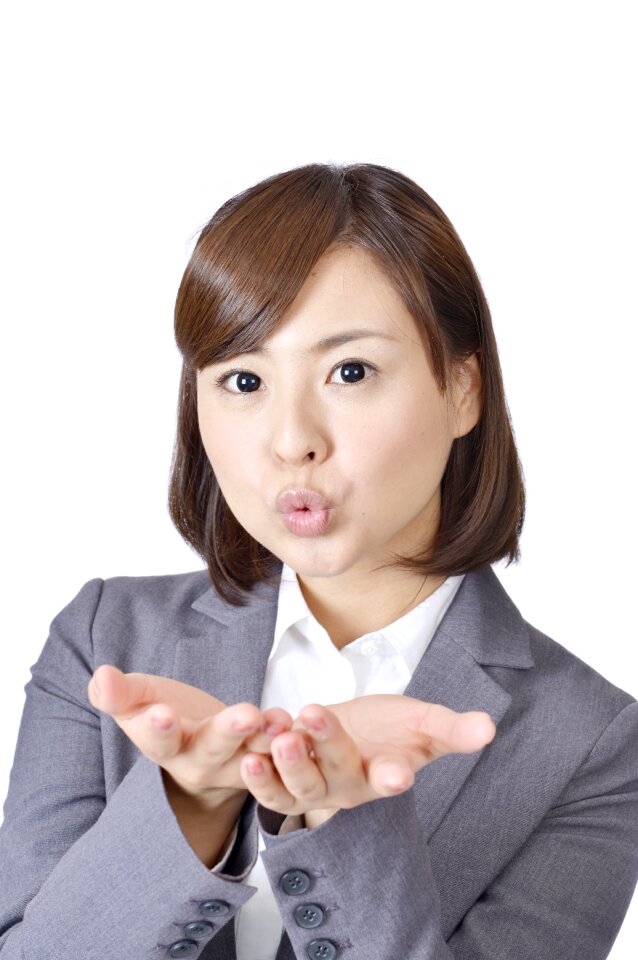 Business woman blow a kiss