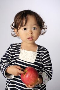 Child girl portrait apple