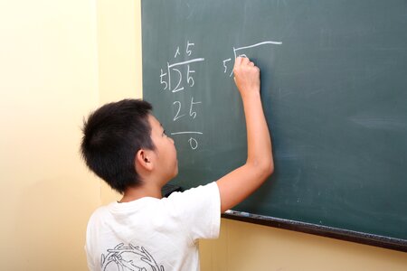 Child boy blackboard