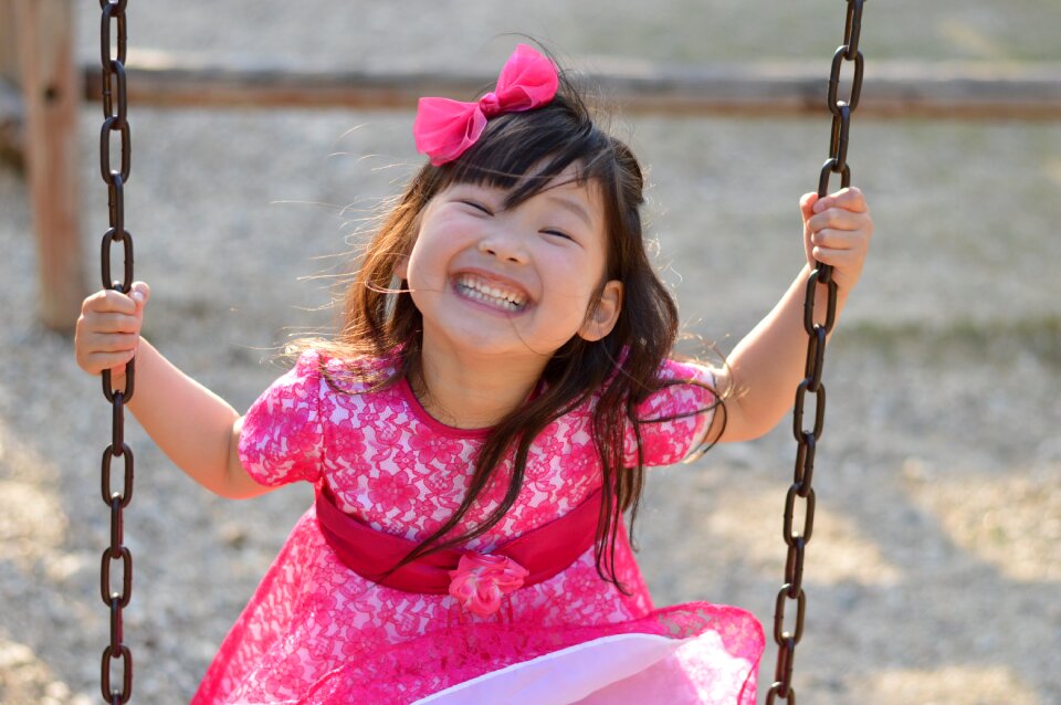 Child girl smile swing