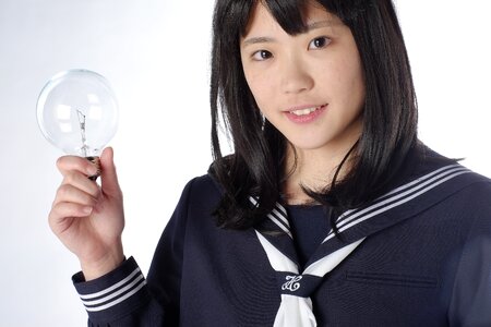 Female student light bulb