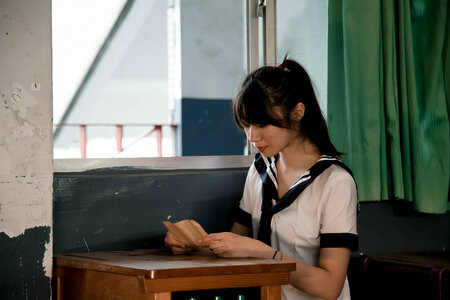 Female student reading letter