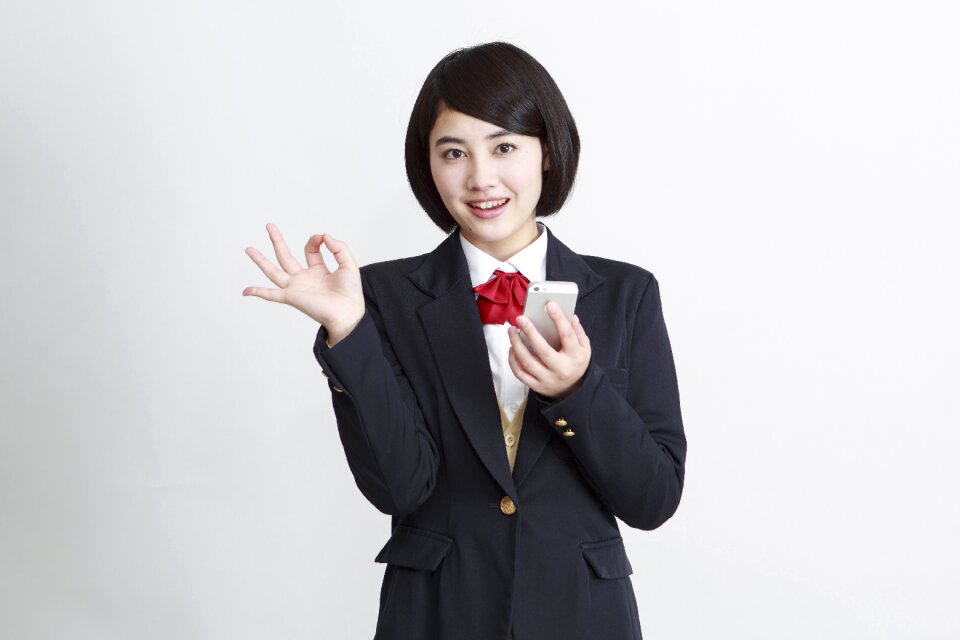 Female student ok sign