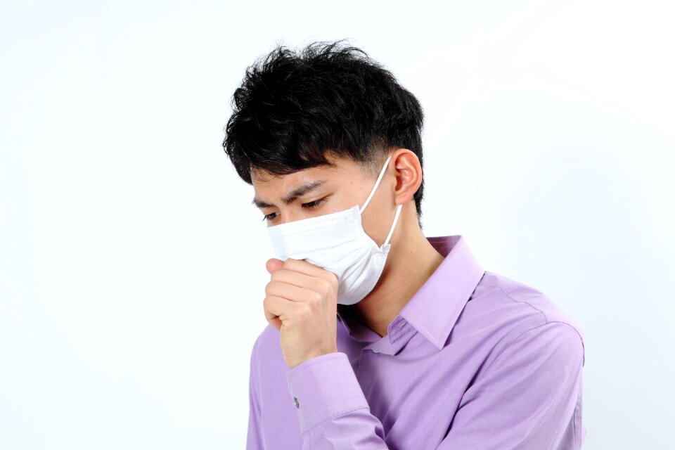 Man portrait cold cough