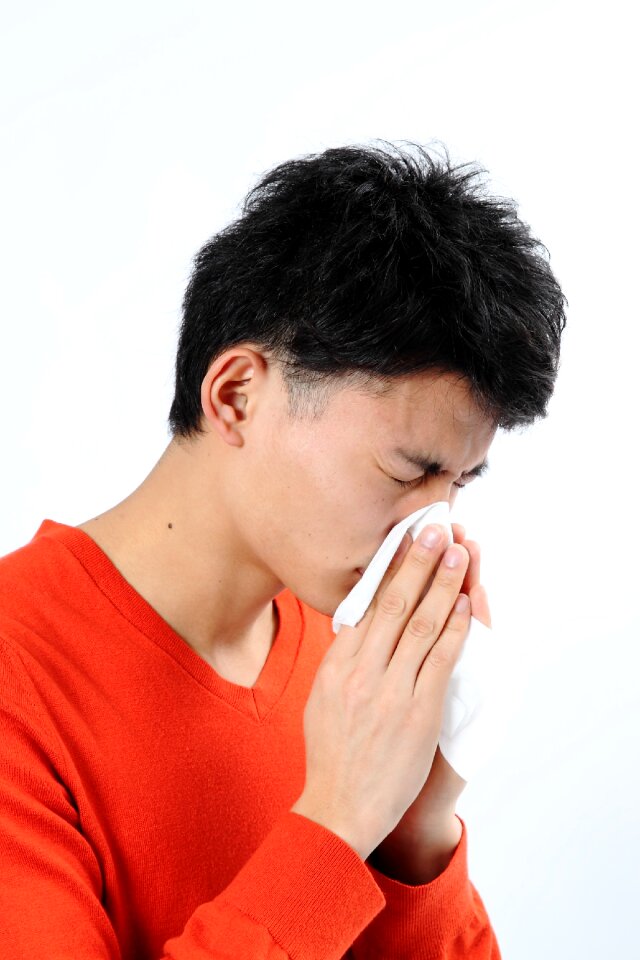 Man portrait blow nose