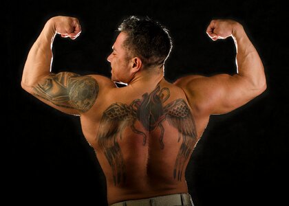 Man tattoo muscle photo