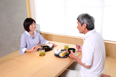 Old couple cooking