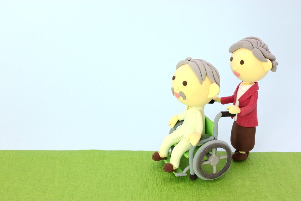 Old couple wheelchair dolls