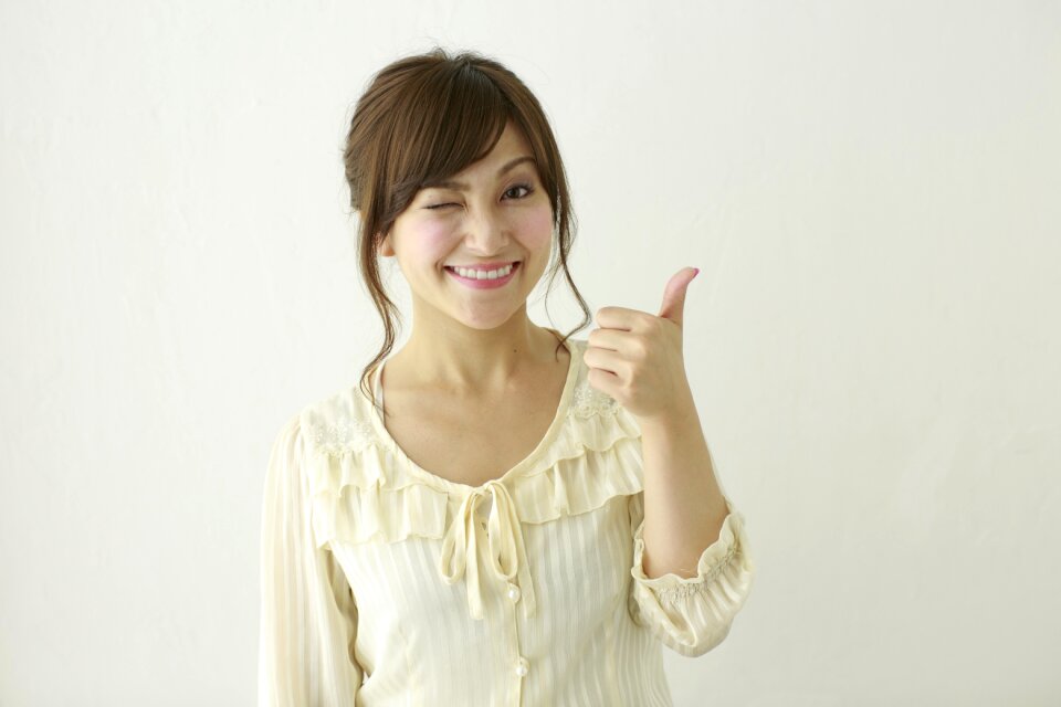 Woman girl portrait thumbs up