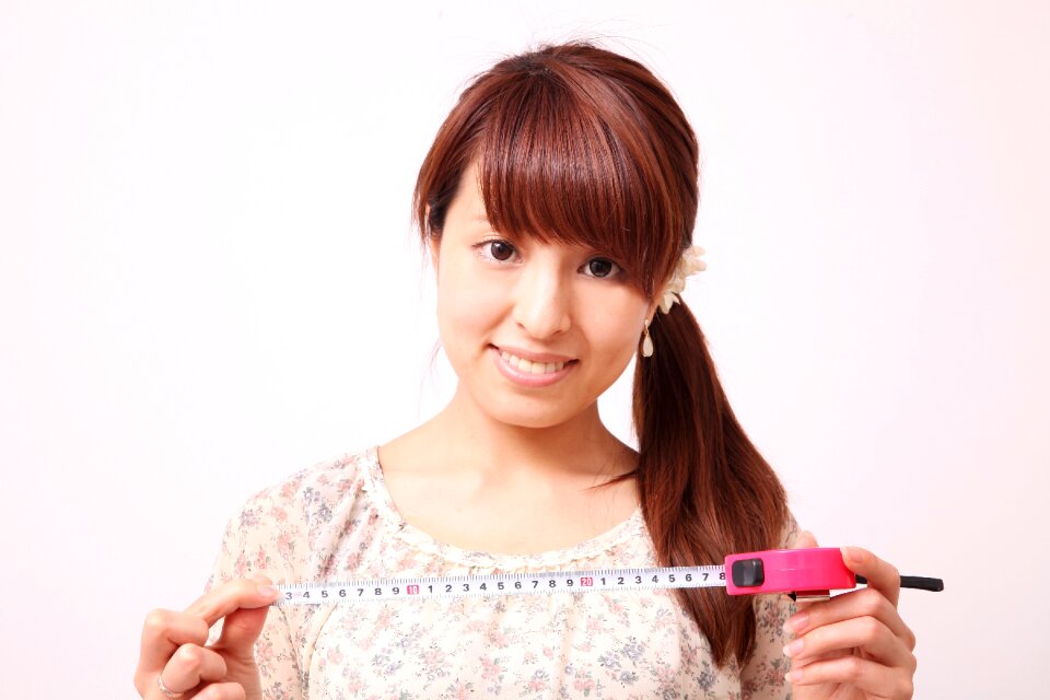 Woman girl portrait tape measure