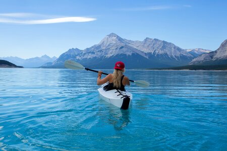 Woman kayak lake photo