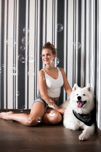 Woman girl samoyed dog