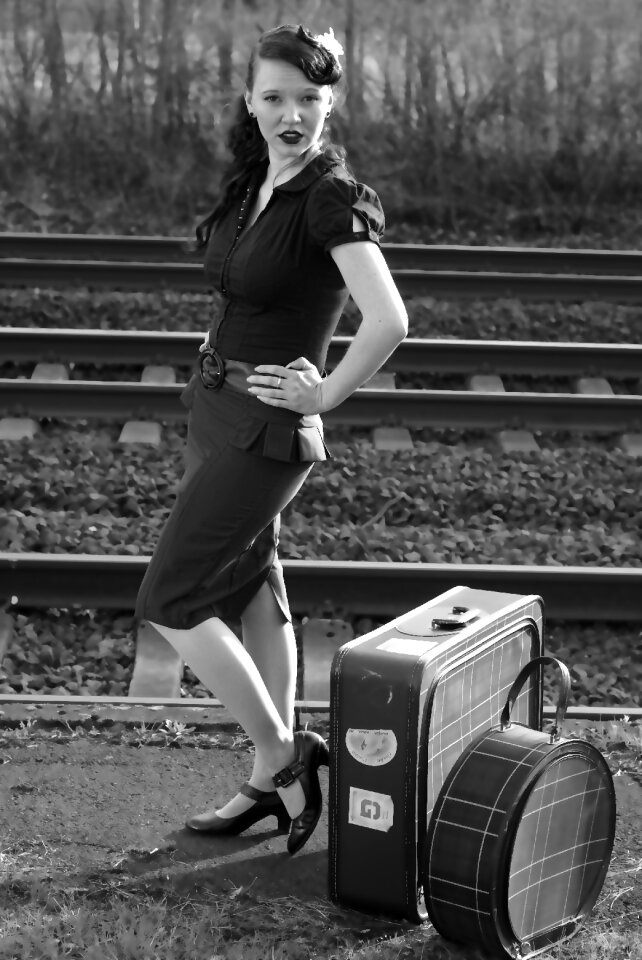 Woman luggage railway station