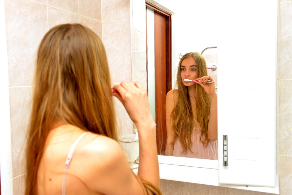 Woman girl toothbrush