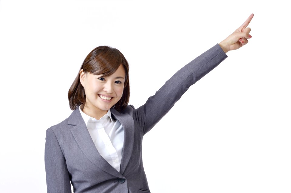 Business woman pointing finger
