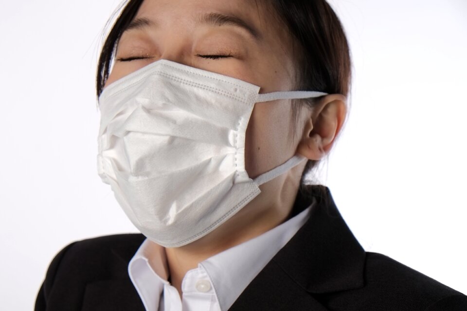Businesswoman cold sneeze