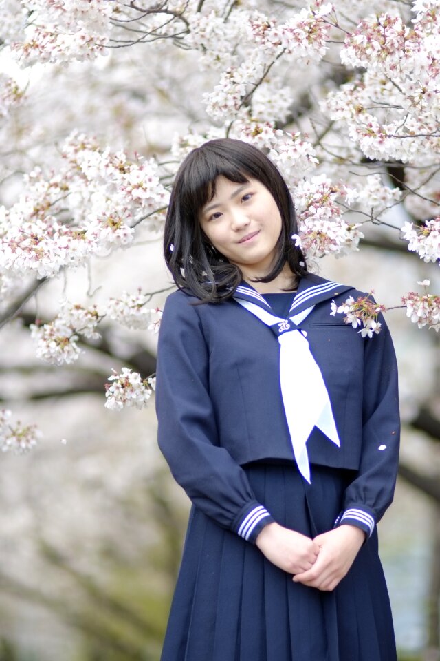 Female student cherry blossoms